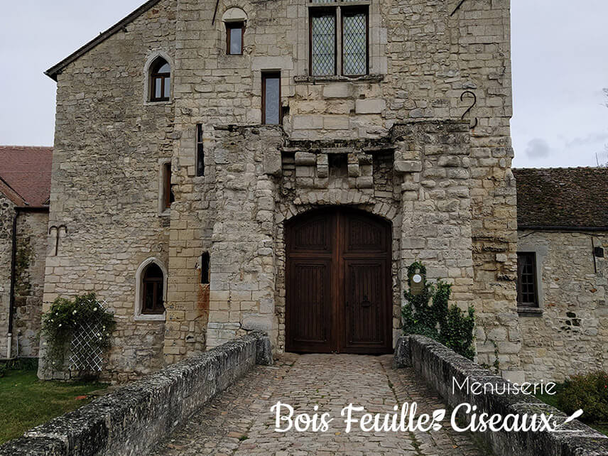 Restauration d'un portail de château en chêne